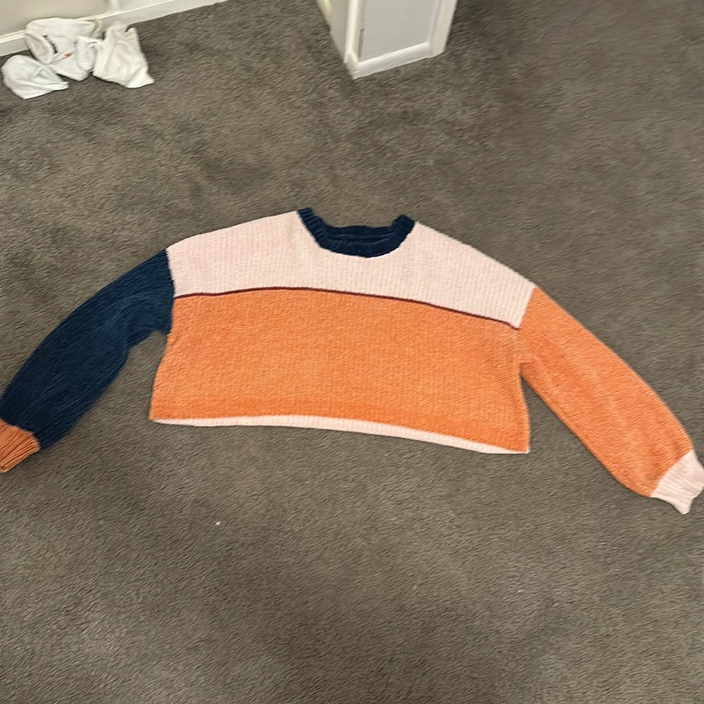 Striped blue, pink, maroon and orange sweater knitted